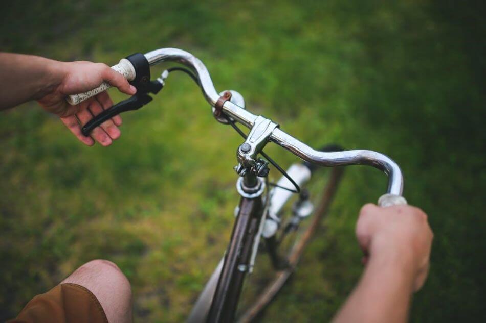 mustache bicycle handlebars on grass path