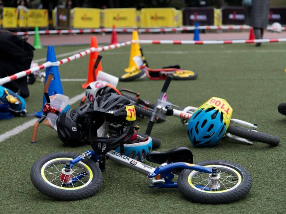 Kids bikes on grass after or before a bike race