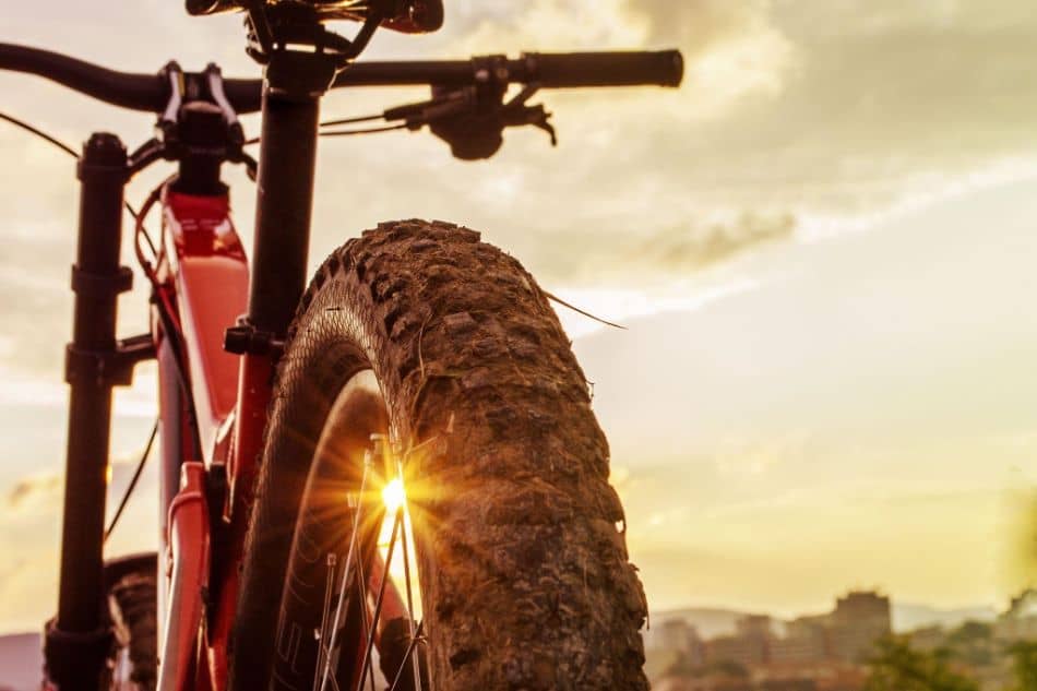 Back shot of mountain bike on sunset rear wheel mountain bike tire tires 27 5 inch mtb bicycle