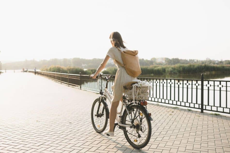 Outdoor portrait of woman on a bicycle