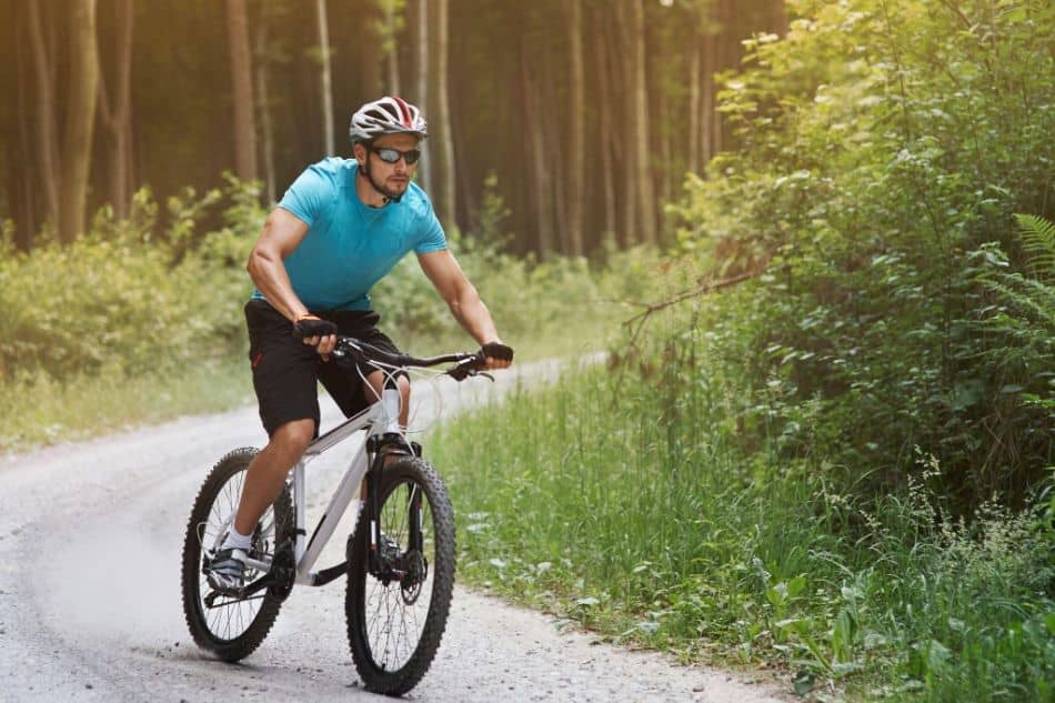 Pensive man riding down the hill