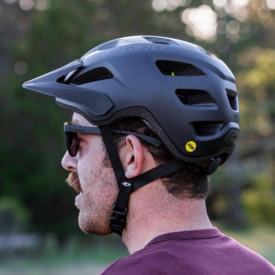 man with black Giro mountain bike helmet with MIPS