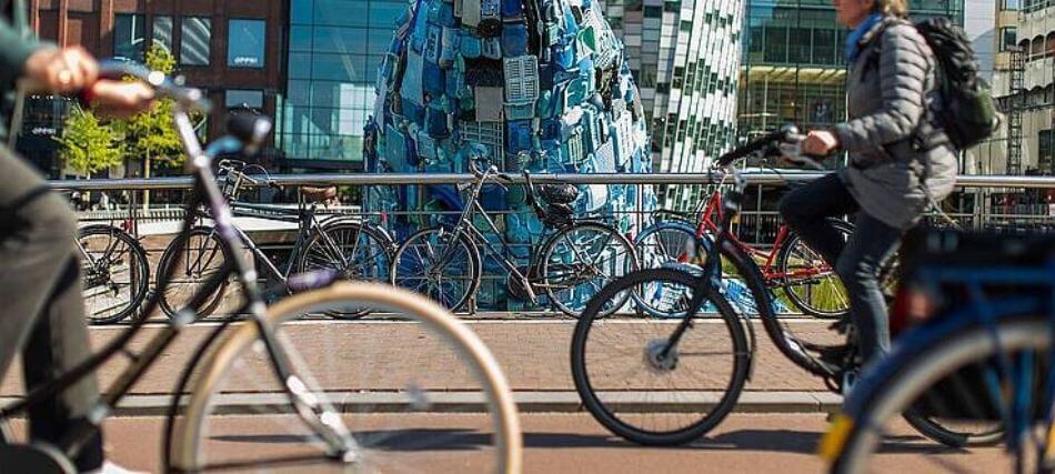 people cycling in bike lanes in Utrecht the Netherlands