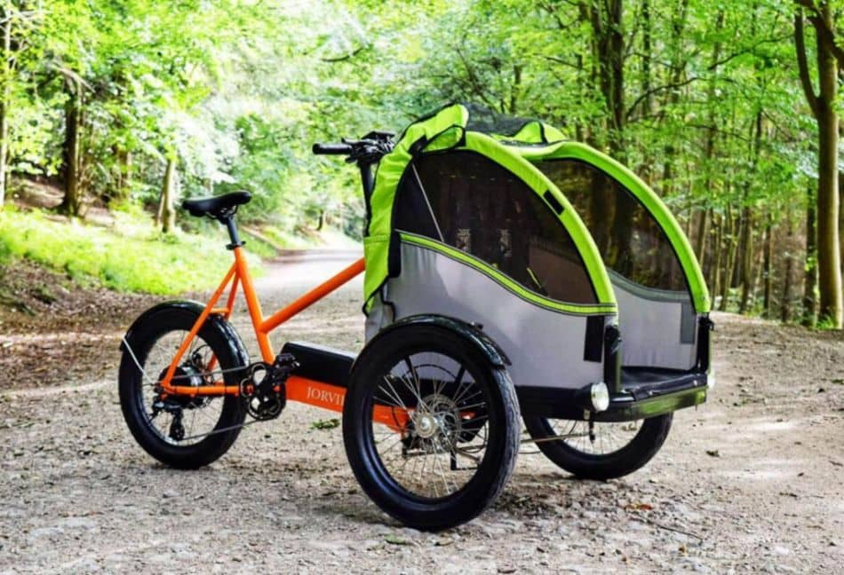 Electric Tricycle with childrens carrier. Photo Credit Unsplash.