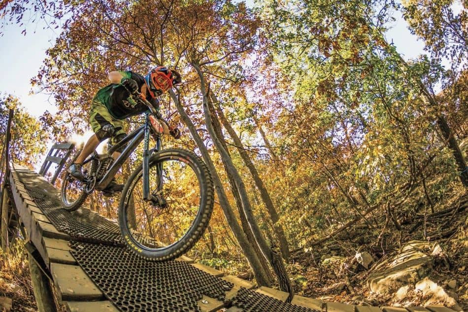 Rider on man made feature in Mountain Creek Bike Park